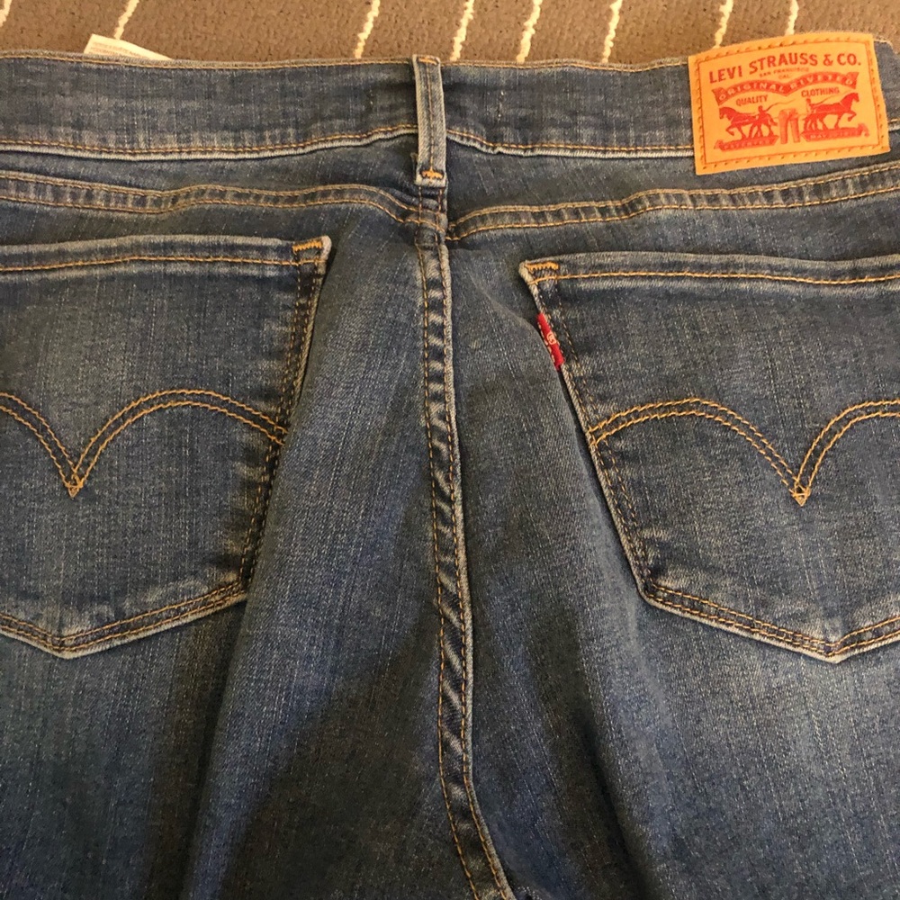 levis- 710 super skinny (medium wash)